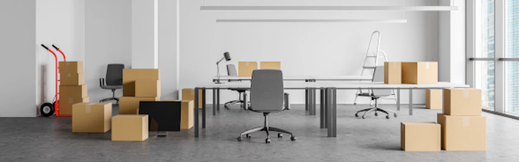 An office full of moving boxes