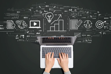 Typing on a computer keyboard with pictograms.