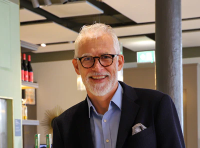Daniel Reimann, Director of the Ospena Group