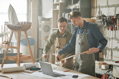 Two craftsmen in a workshop.
